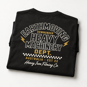 Earthmoving Downunder Heavy Machinery Dept. Black tee folded closeup showing the back print