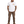 Man wearing a white t-shirt with a logo and brown pants on a white background
