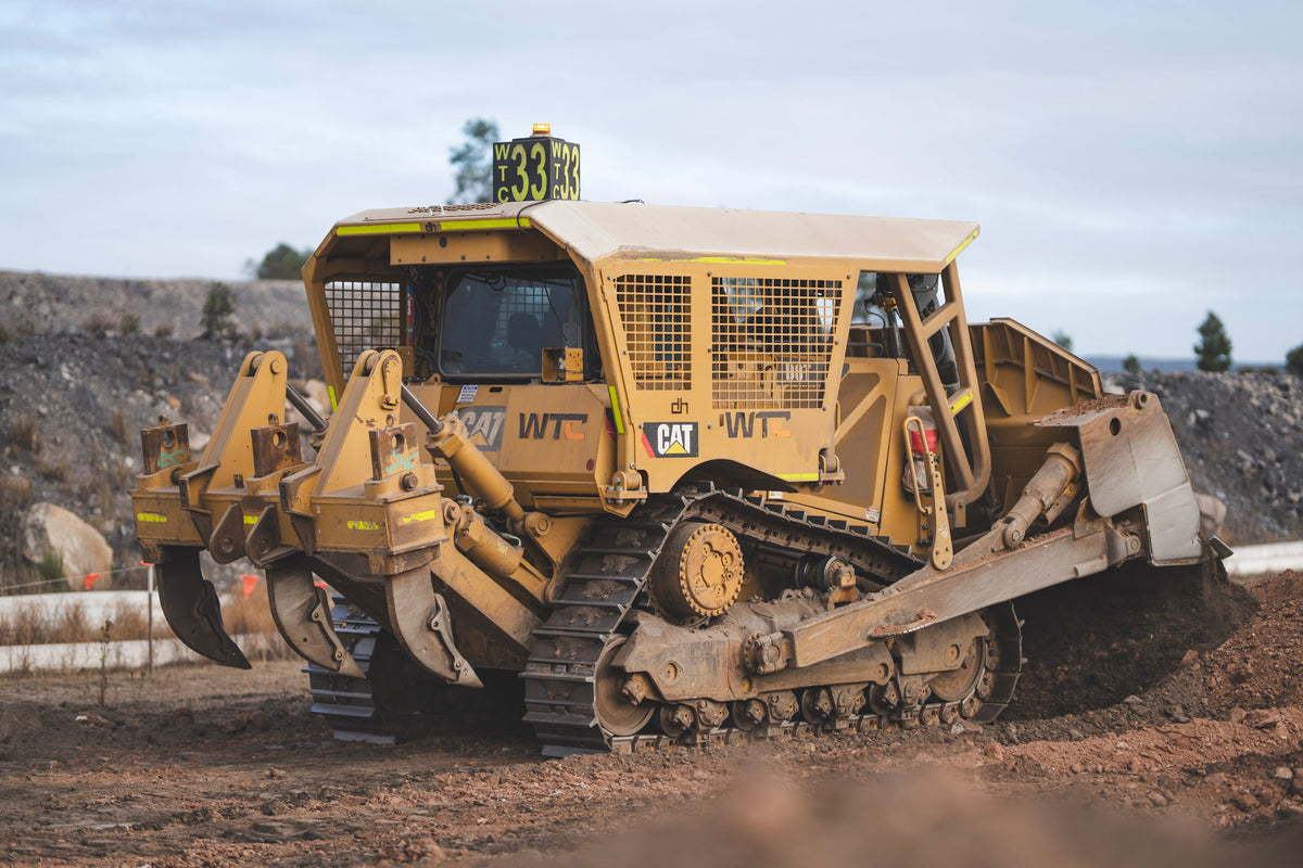 Yellow tracked dozer working on an earthmoving site — DSC08649 by Earthmoving Downunder.
