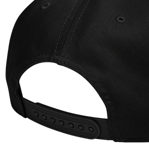 Close-up of the black Otto 31-069 cap rear opening and adjustable plastic snapback closure.