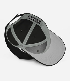 Interior of the black Richardson 258 SnapBack showing the grey sweatband, seam tape, Richardson label and underside of the peak.