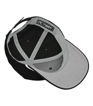 Interior of the black Richardson 258 SnapBack showing the grey sweatband, seam tape, Richardson label and underside of the peak.